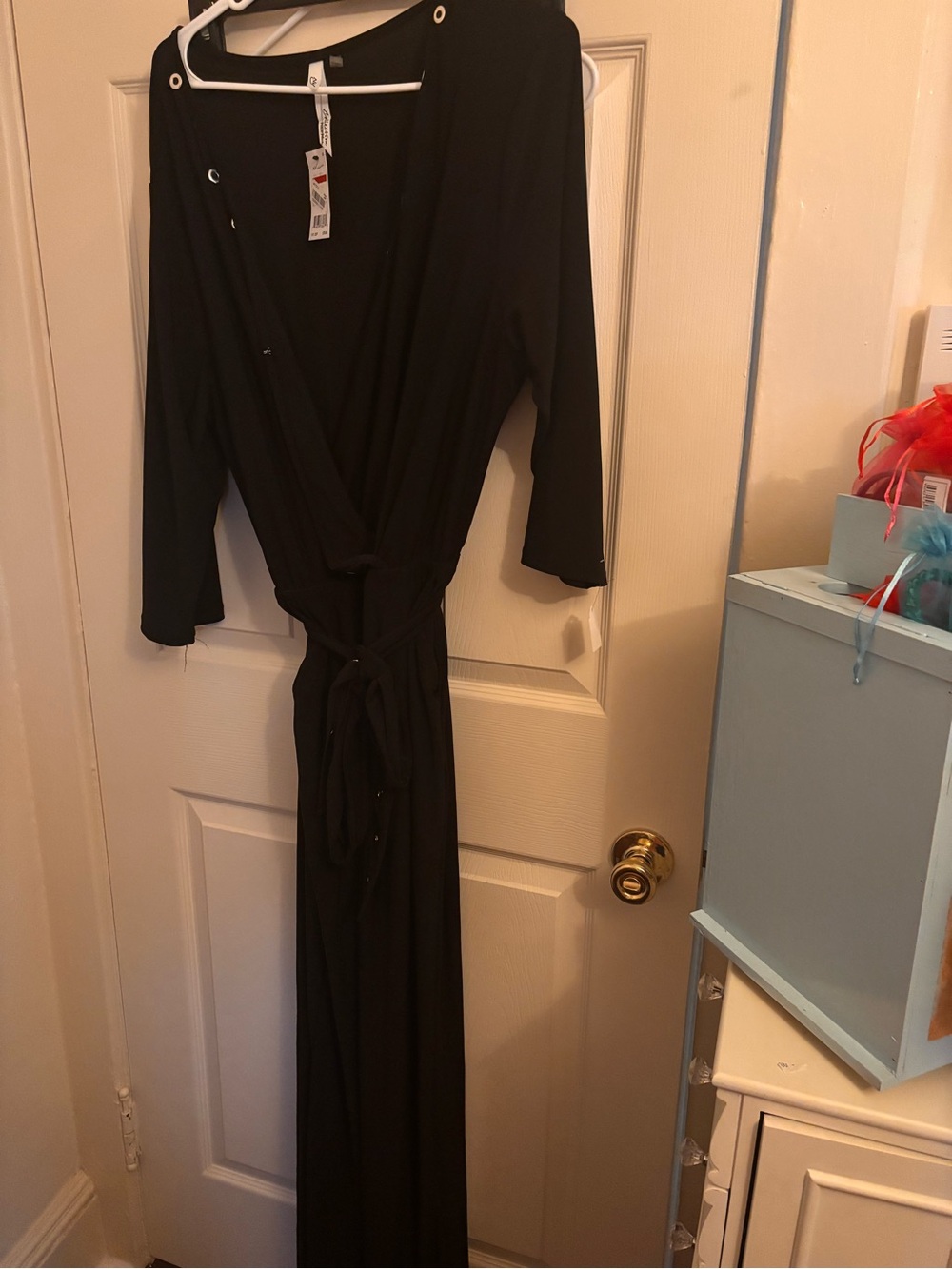 Black Wrap Jumpsuit with Waist Tie and Grommet Detail